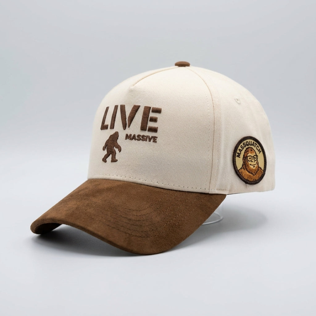 Live Massive SmartSquatch snapback hat - 3/4 angle showing the round embroidered MASSQUATCH SmartSquatch character side patch