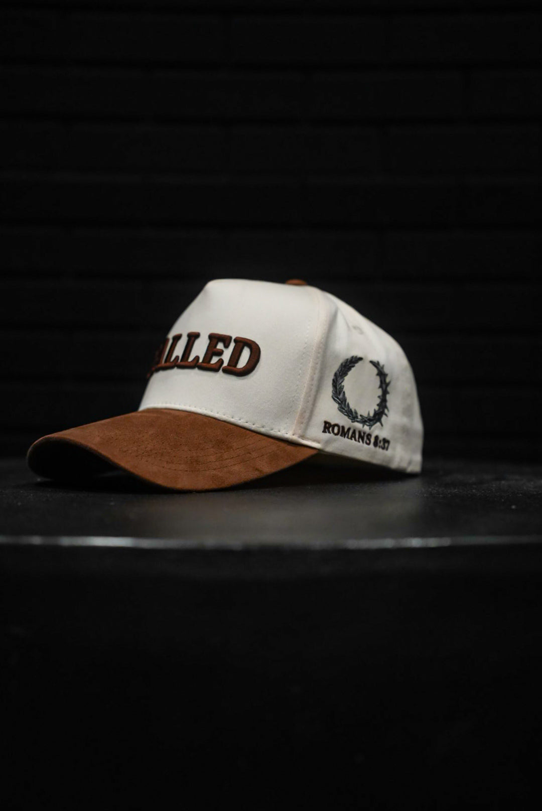 AXIOS — CALLED / TO CONQUER · cream/brown suede · Romans 8:37