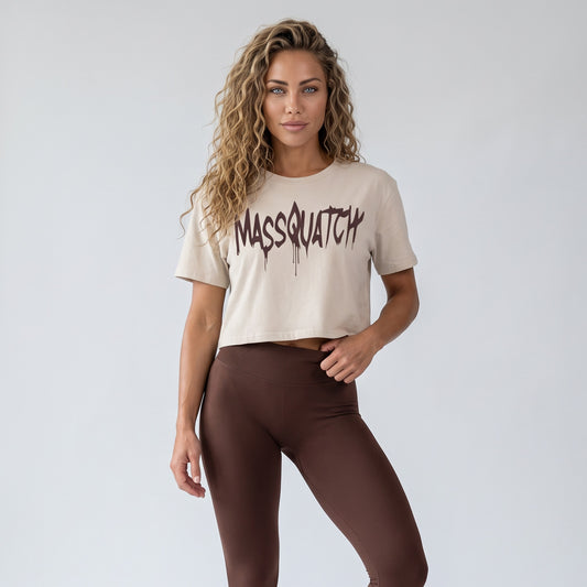 Bone baby tee with a Walnut drip logo, worn