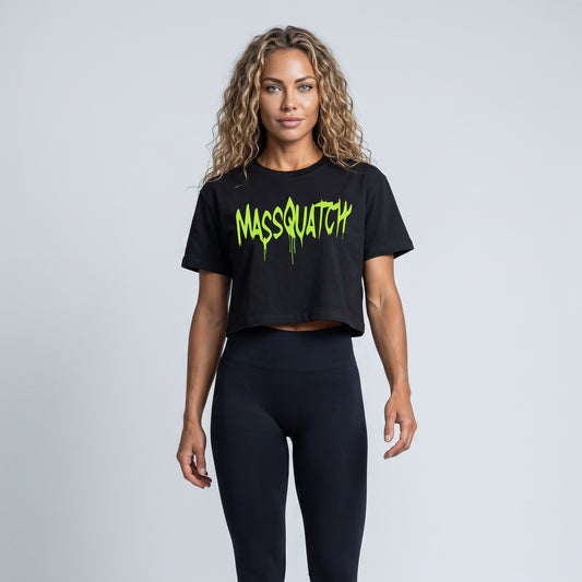 Black baby tee with a Hazard Lime drip logo, worn