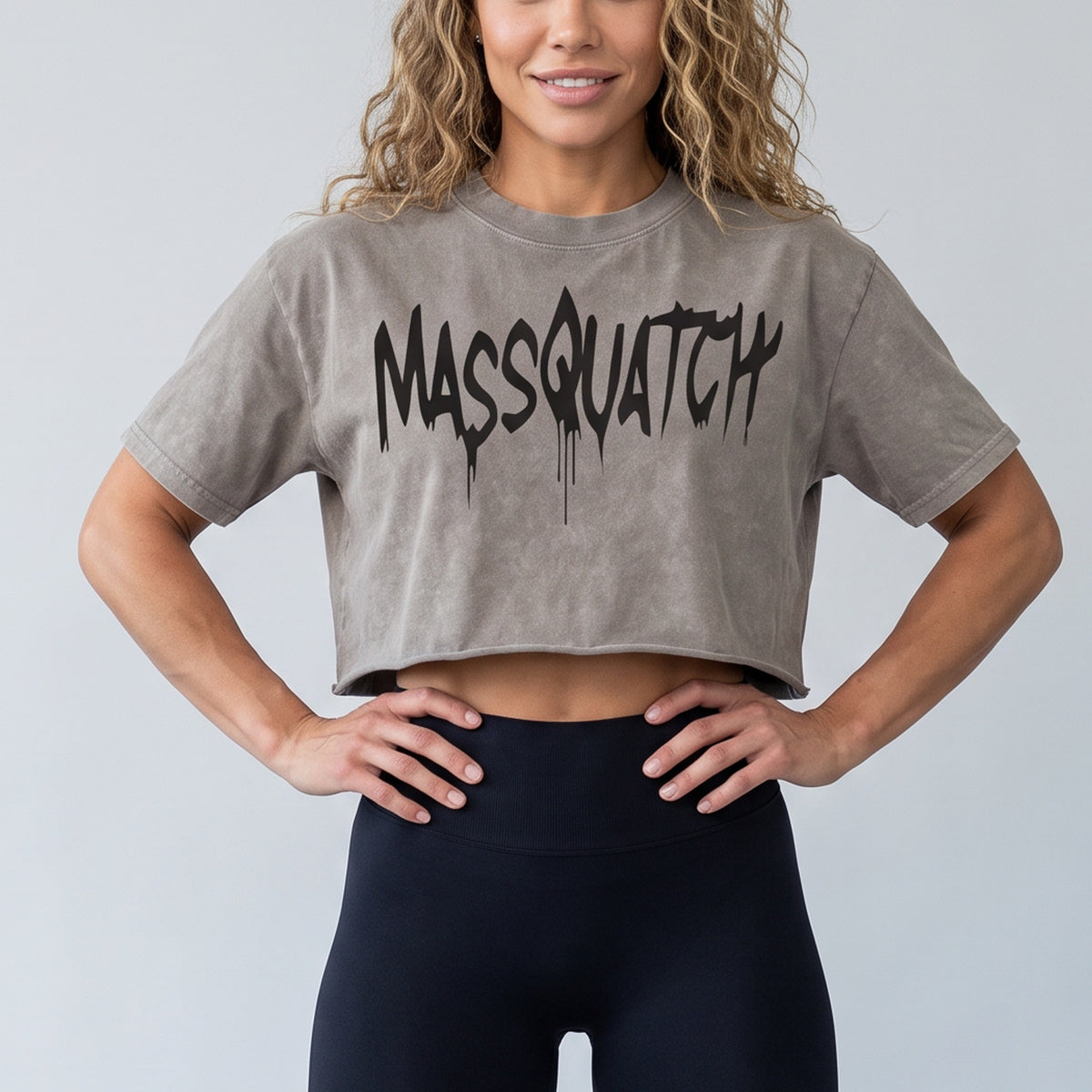 Grey Stone stone wash crop tee with a Black drip logo, print close-up